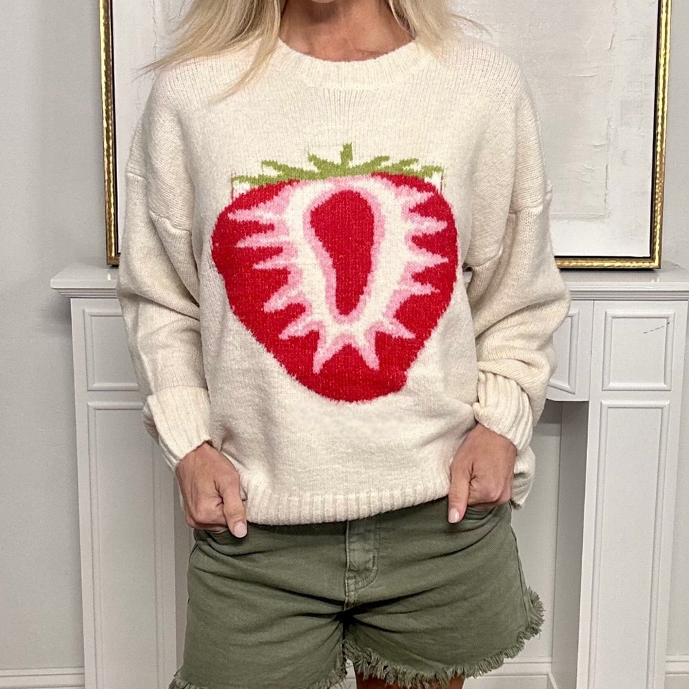 New with tags. Strawberry sweater.